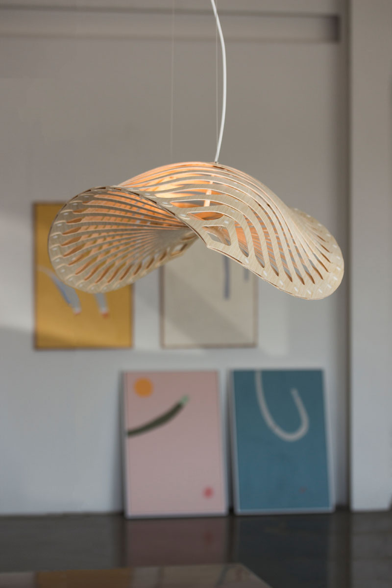 Inspired by the microscopic organisms living in our oceans, New Zealand-based designer David Trubridge has created Navicula - a modern and sculptural light fixture made from CNC cut bamboo plywood.