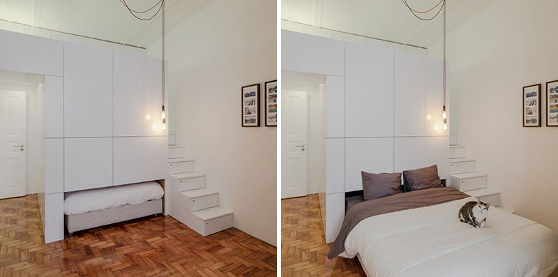 This small modern apartment has a wall of white storage cabinets that allows a pull-out bed to be hidden within it. Depending on how much you pull the bed out, it can also double as a couch or day bed.