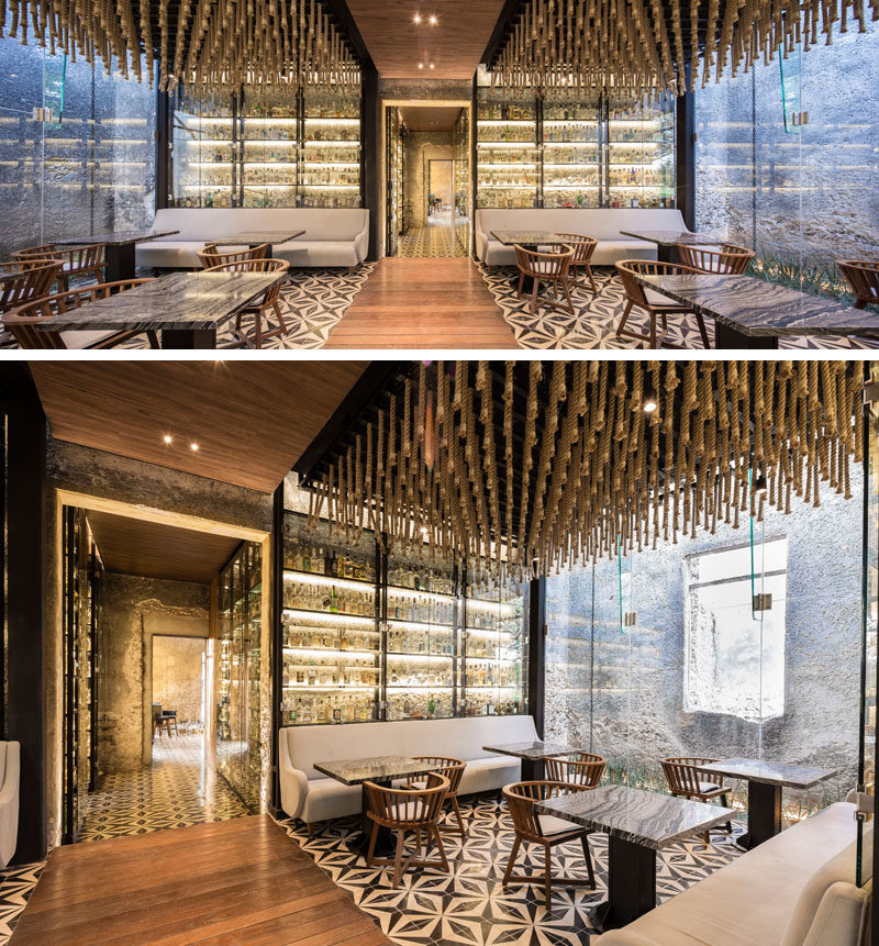 In the main dining area of this modern restaurant, henequén (agave) strings produced by the last rope factory in Yucatan, hang from the ceiling to help with acoustics.
