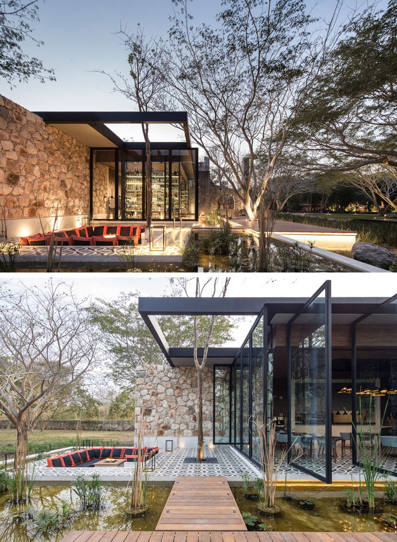 This modern restaurant, located in renovated farm buildings in Mexico, has an outdoor sunken lounge with colorful throw pillows and a firepit.