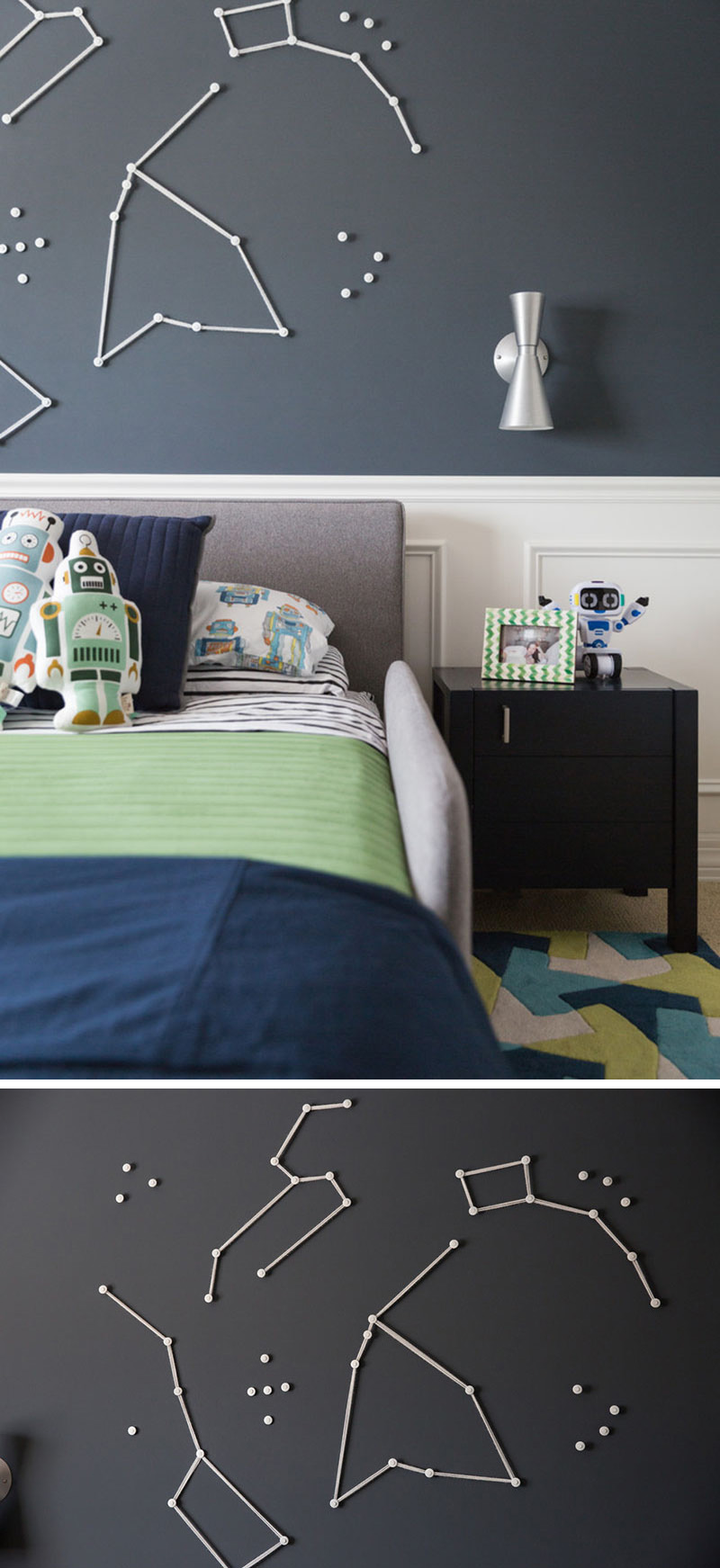 This space themed boy's bedroom has decorative constellation wall art on the blue-grey wall above the bed.