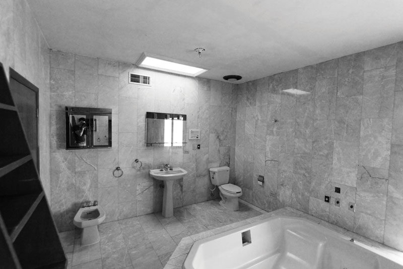 This is the before photo of a bathroom that received a modern renovation.