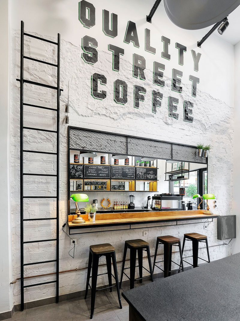 Andreas Petropoulos has recently completed the design of Daily Dose, a small takeaway coffee bar in the city of Kalamata, Greece, that features a white, black and wood interior.