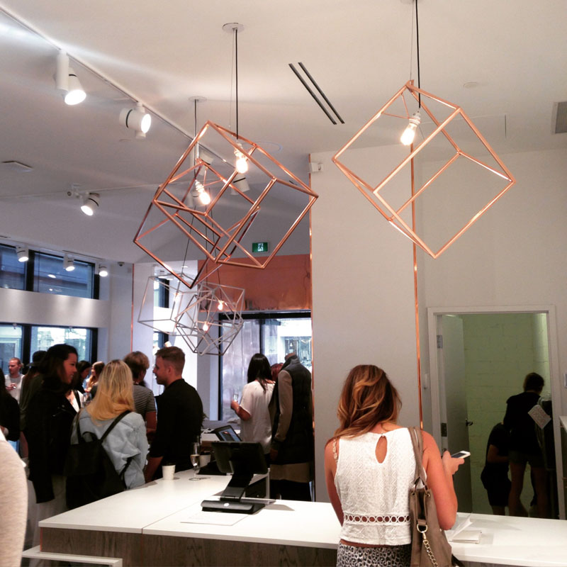 Modern in design, these copper pendant lights makes a bold statement in any space due to it's large size and geometric form.