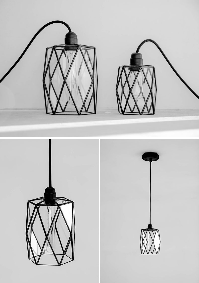 These modern glass pendant lights with black details look different geometrically from various angles. 