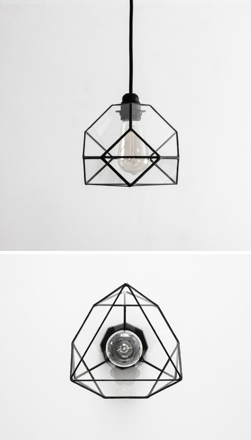 This small glass pendant lamp with black lines, looks different geometrically from various angles. 