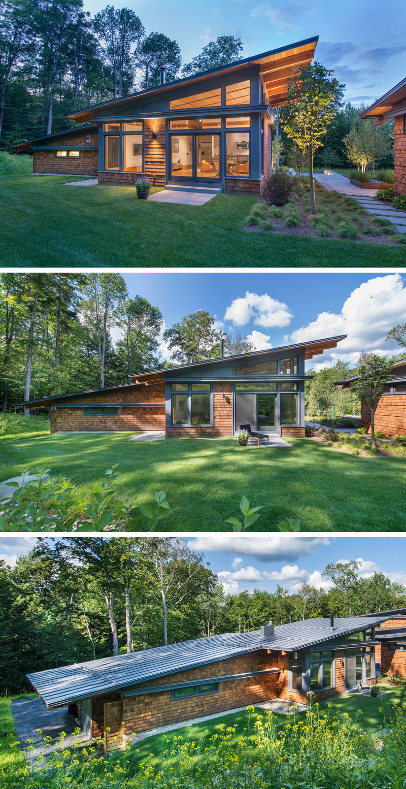 This modern guest house follows the same design of the main house, with a sloped roof, plenty of windows and wood shingles. Double doors open up to the backyard, while the garage is situated off to the side.