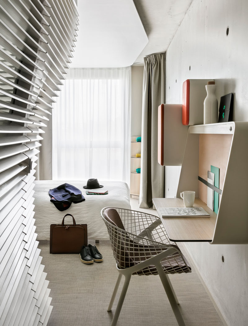 This modern hotel room features a wall mounted desk, ideal for when you need to get some work done when travelling. 