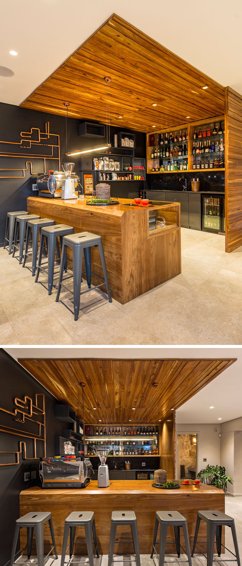 This modern wood bar has everything needed for making high quality coffee and cocktails. Black floating rectangular boxes blend in to the dark accent wall and provide additional storage.