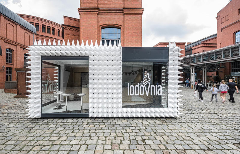 mode:lina architekci have designed LODOVNIA, a mobile ice cream shop in Poland that's covered in almost 1,000 white sports cones, representing the shape of an ice cream cone.