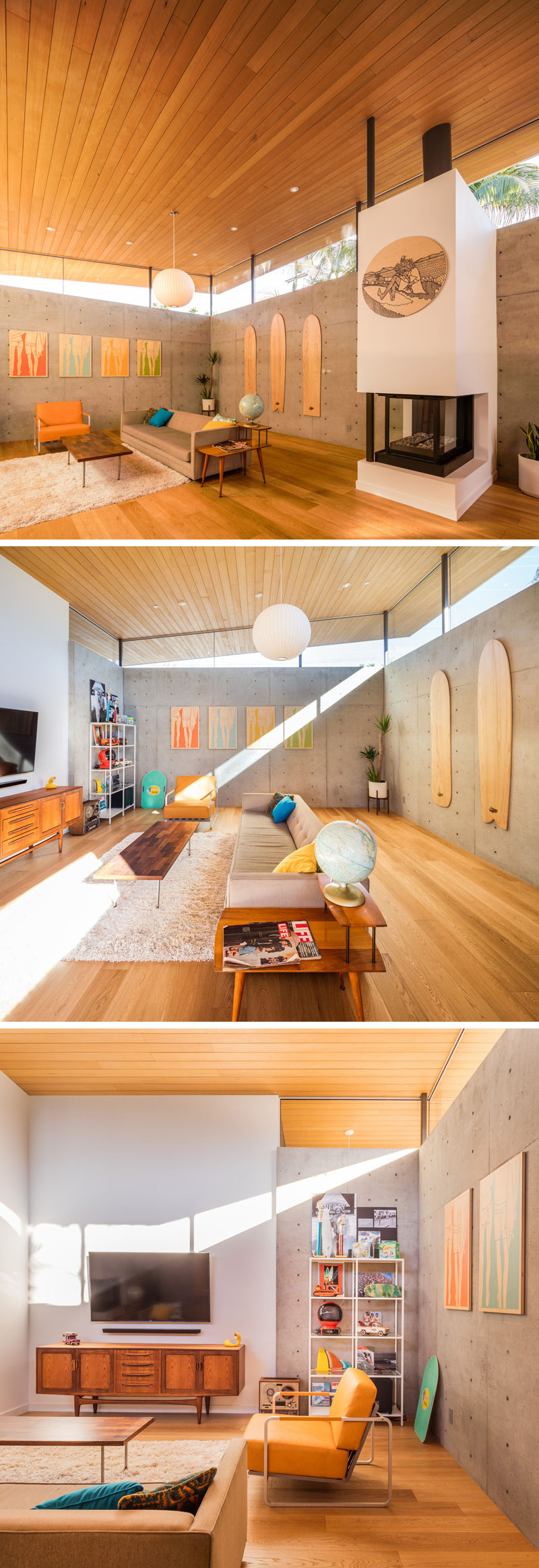 This modern living room features concrete walls with a wood ceiling and floor. Retro toys, wood furniture and artwork adds character to this relaxed space. A white and black fireplace stands out and keeps the space warm.