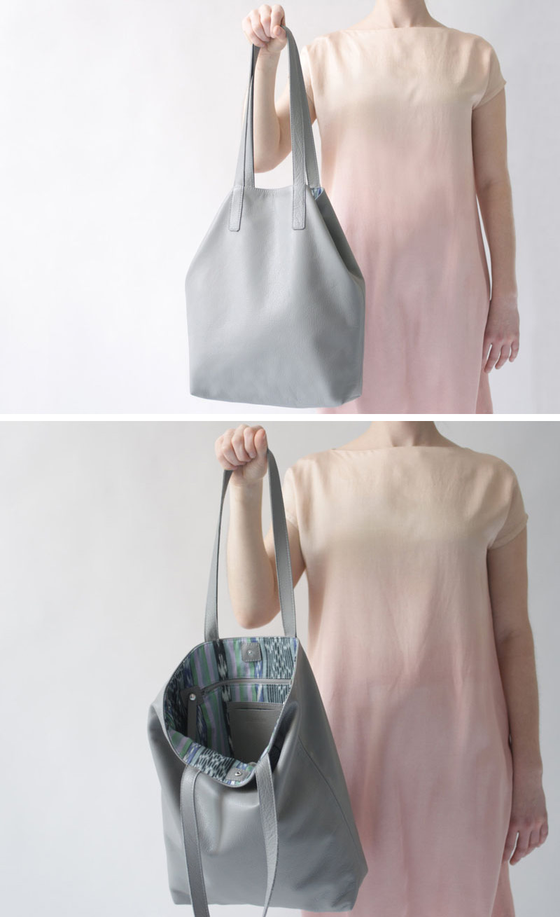 This modern large grey leather bag has a pattern lining and is easy to use. 