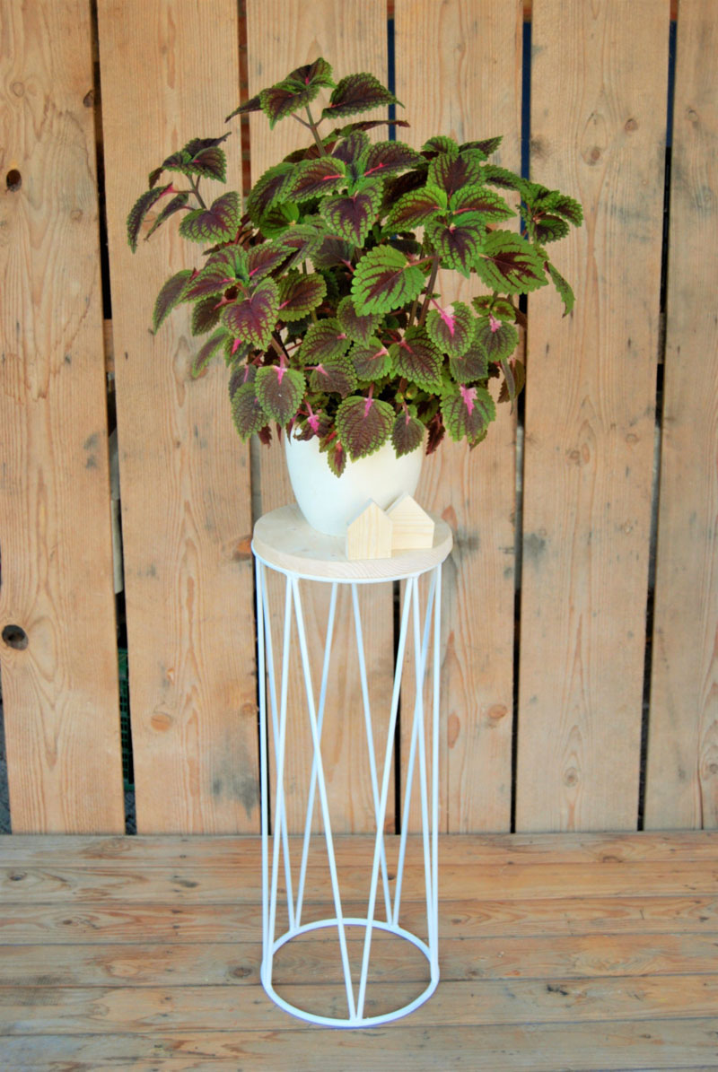 With an easy to move wood platform, a pot can be put on top of the modern plant stand, or placed directly into the light blue stand.  #PlantStand #ModernPlantStands #Garden #Plants #ModernHomeDecor