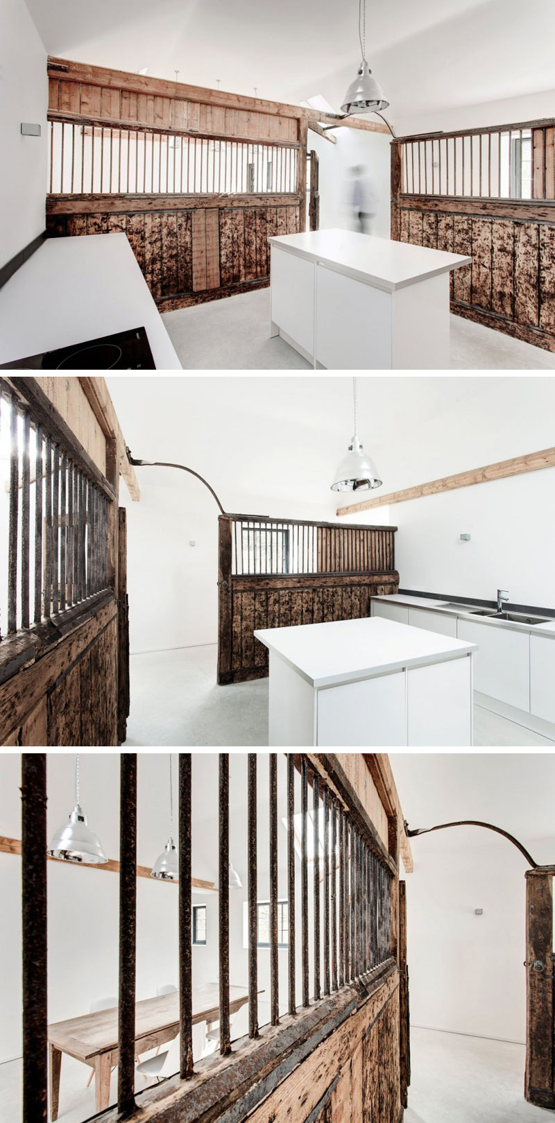 Timber walls are the main focus in this modern kitchen, providing warm hues while displaying the intricacies of the original wood. A white island below a silver pendant light provides extra work space in the kitchen.