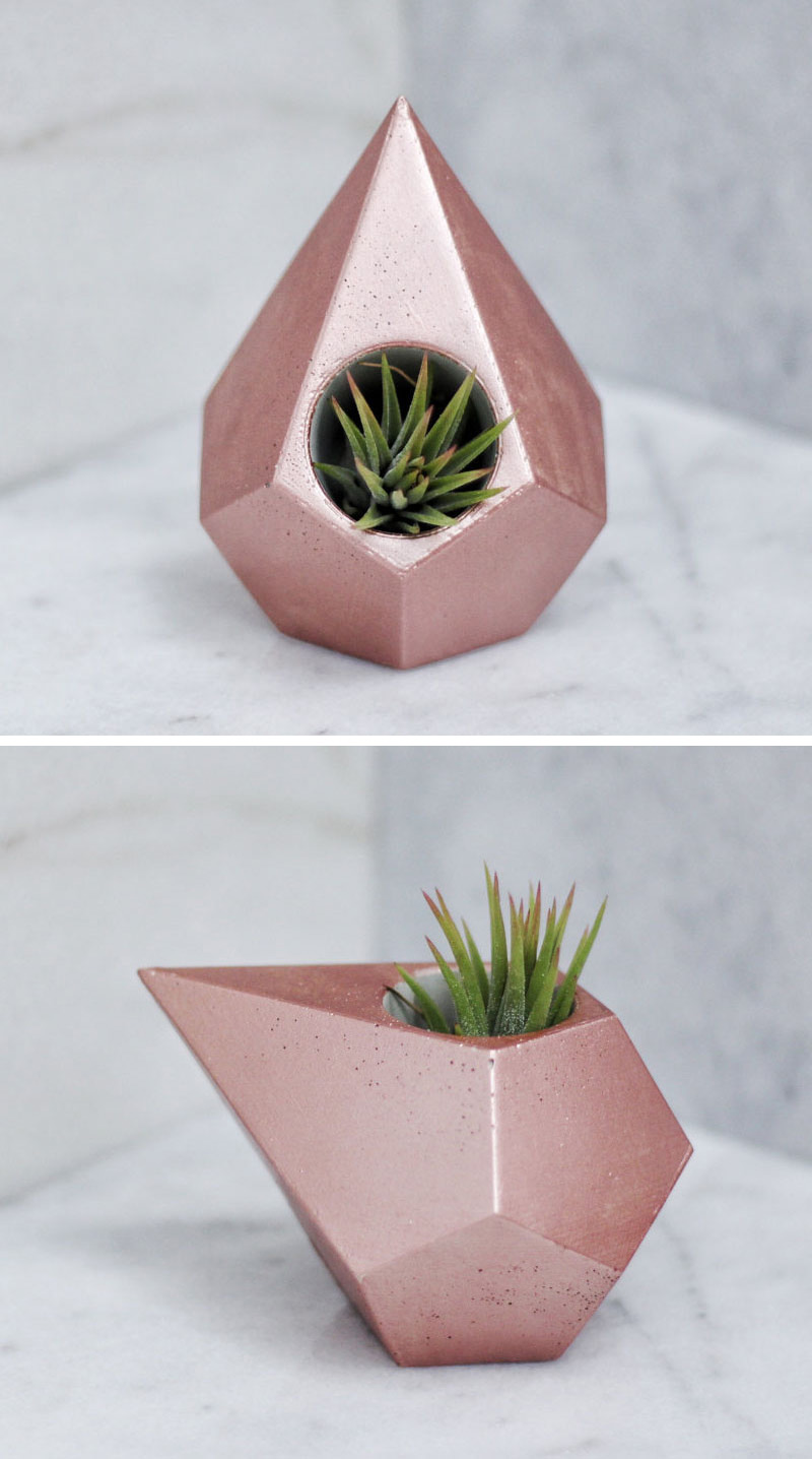 Painted rose gold, this modern geometric teardrop concrete planter fits easily on a desk or table, without disrupting current decor. 