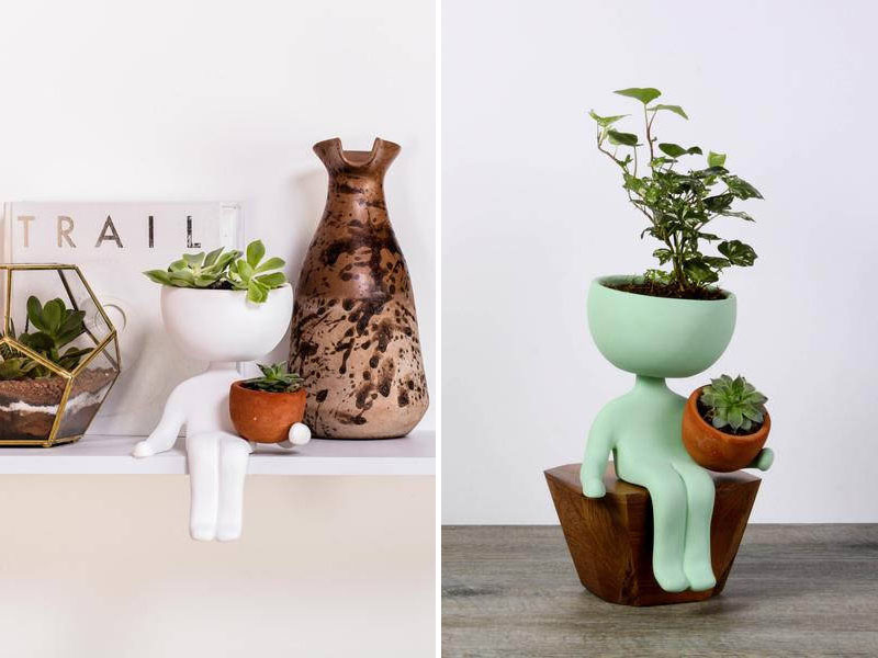 In white and mint green, these fun ceramic planters are handmade, and with the ability to pot two plants, these cute little guys will fit in with any plant display.