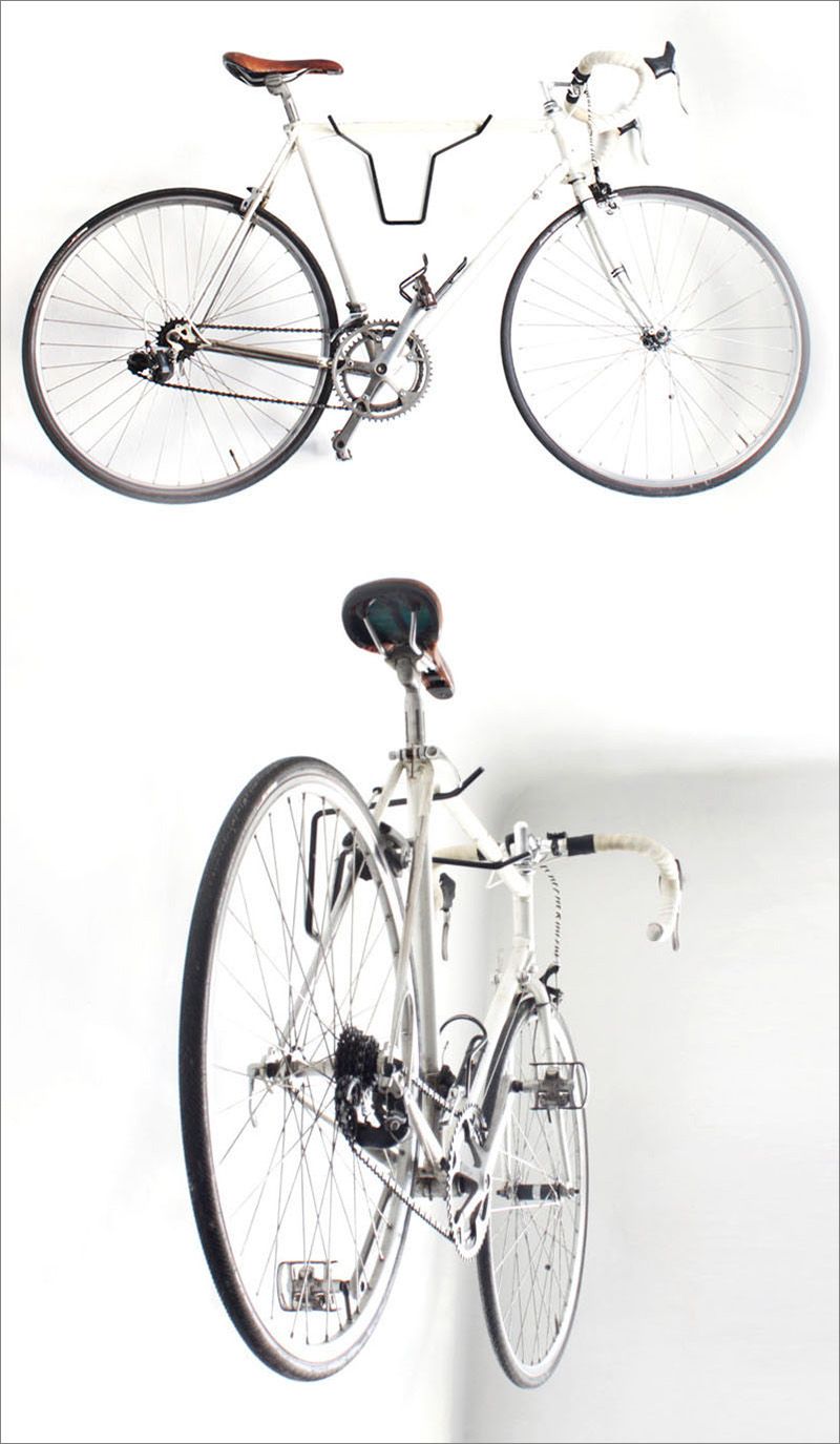 Made from solid black steel, this modern wall mounted bike rack is meant to mimic bull horns.