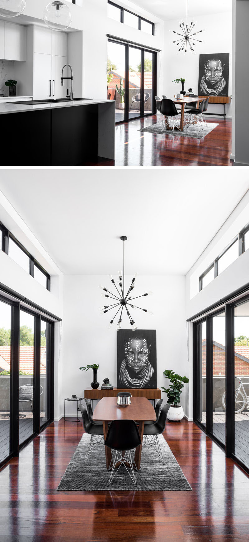 The high ceilings make this modern dining room feel large and elegant, while the sliding doors on each side of the dining room open to outdoor spaces.