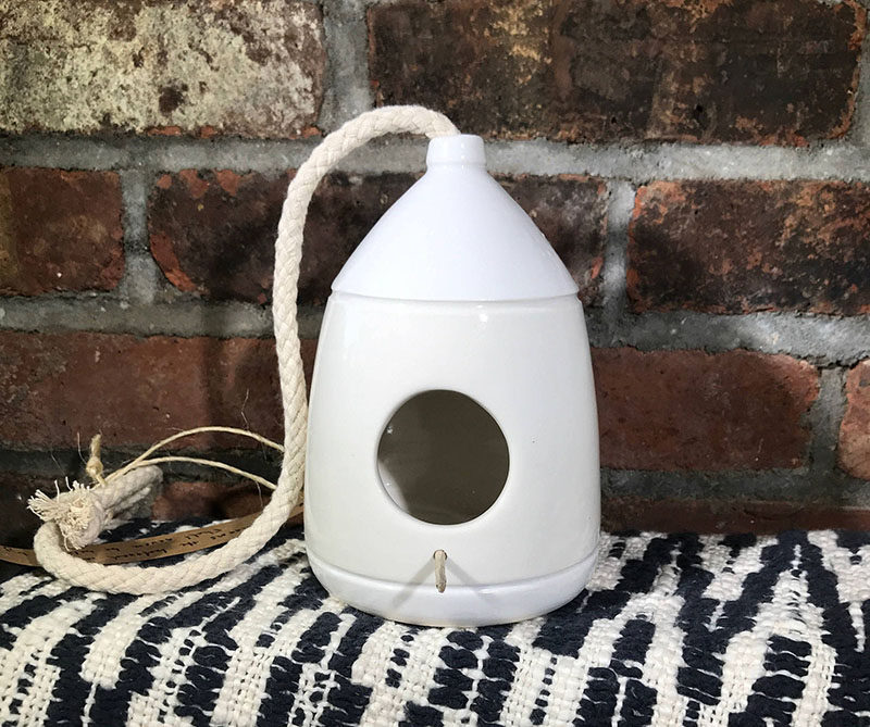 This simple yet modern birdhouse is made from wheel-thrown porcelain.