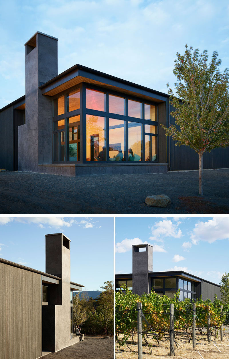 The exterior of this modern winery buildings are covered in ebony stained exterior cedar planks, a dark contrast to the whitewashed interior. 