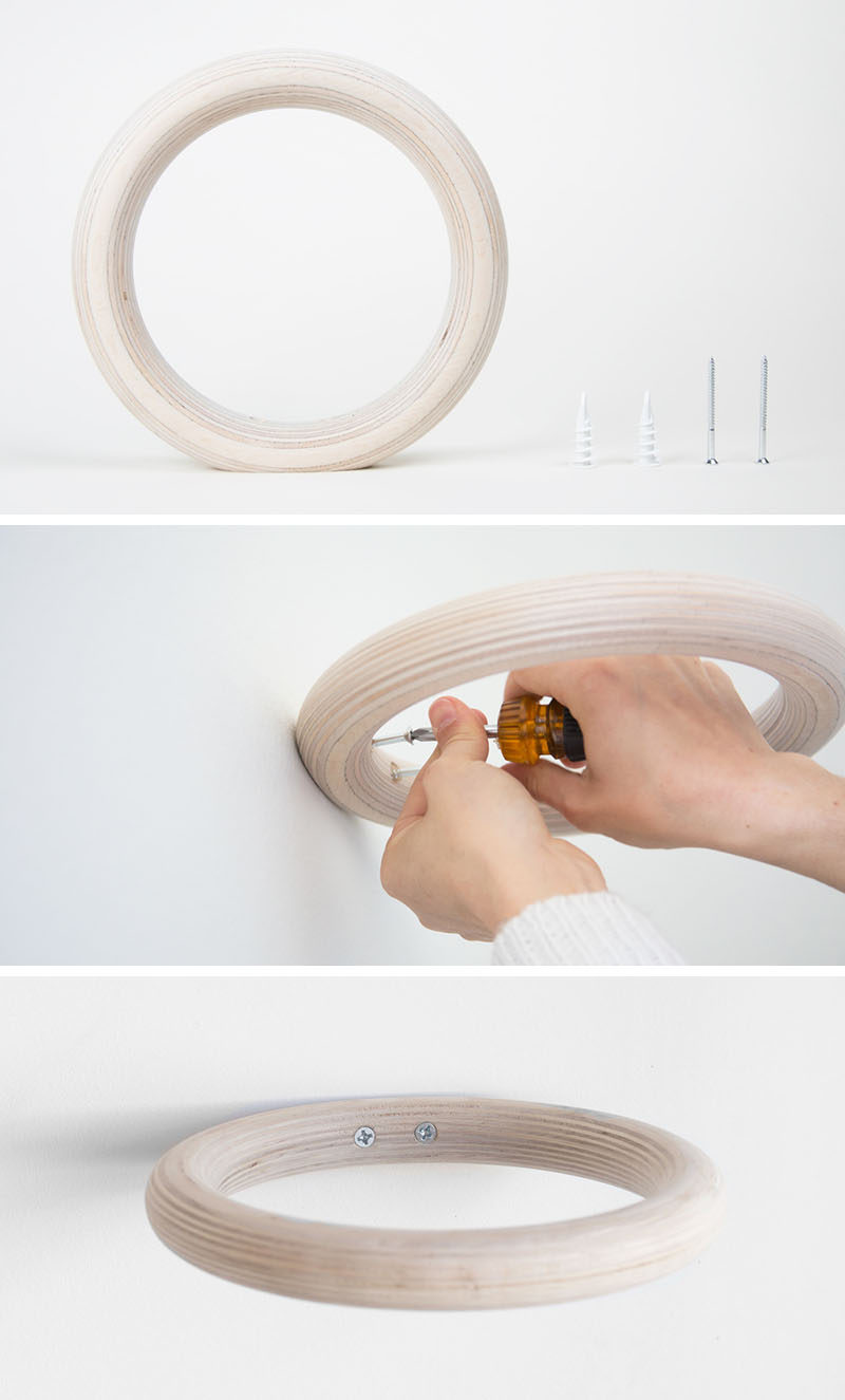 Andrew Deming and Rachel Gant of  YIELD have designed a modern wood ring, wall mounted plant holder, that looks like it simply floats on the wall.