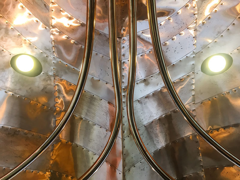 Architecture firm Mizzi Studio have designed Colicci, a new cafe in London, that features a leaf-inspired roof made from 542 individual laser cut copper sections that were attached by hand using traditional techniques and approximately 20,000 rivets.