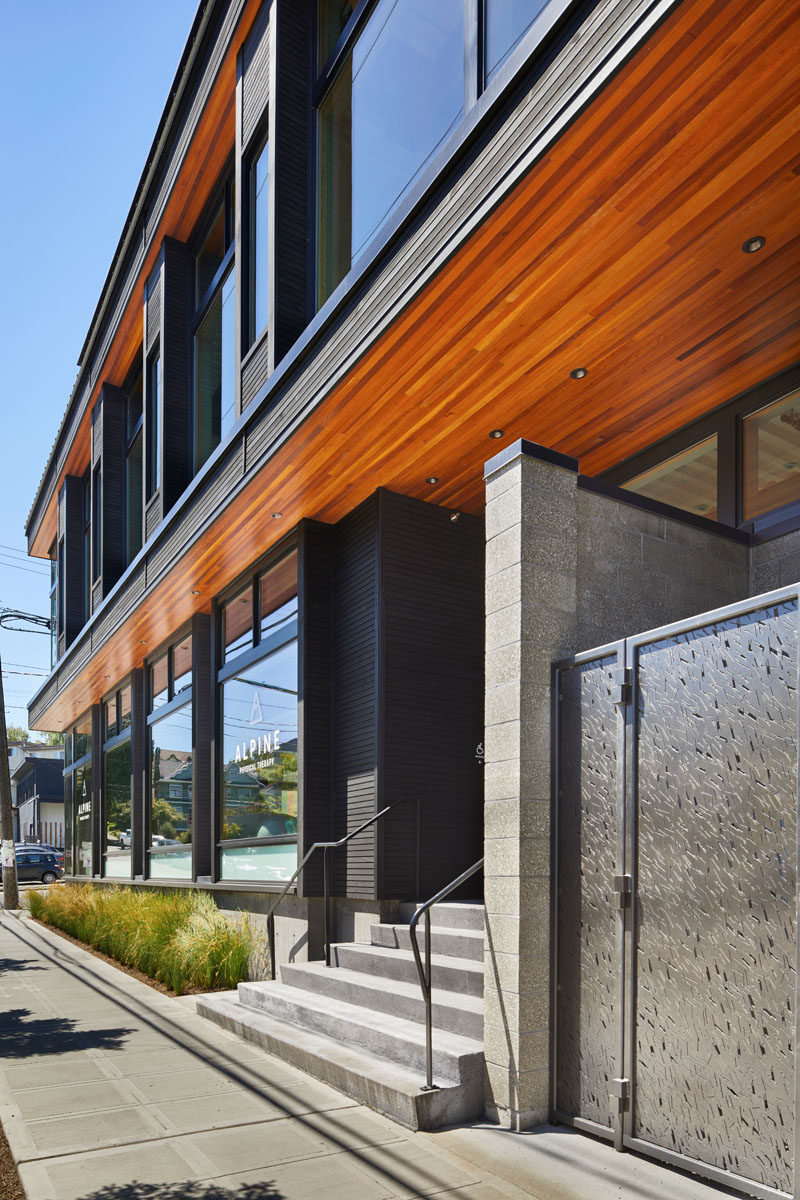 This live-work building in Seattle features deep roof overhangs, built-in shades and high operating clerestory windows are used to reduce heat gain in summer months.