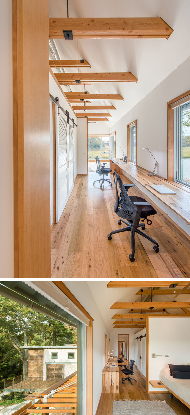 The master suite in this modern house has a built-in desk in the hallway that leads to the bedroom. Large windows overlook the outdoor space below and from the bedroom, there are water views.