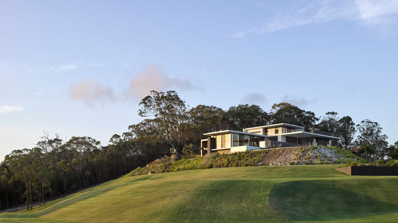 Australian architecture firm Base Architecture, have designed a modern family home in Queensland, that opens up to the surrounding outdoor spaces.