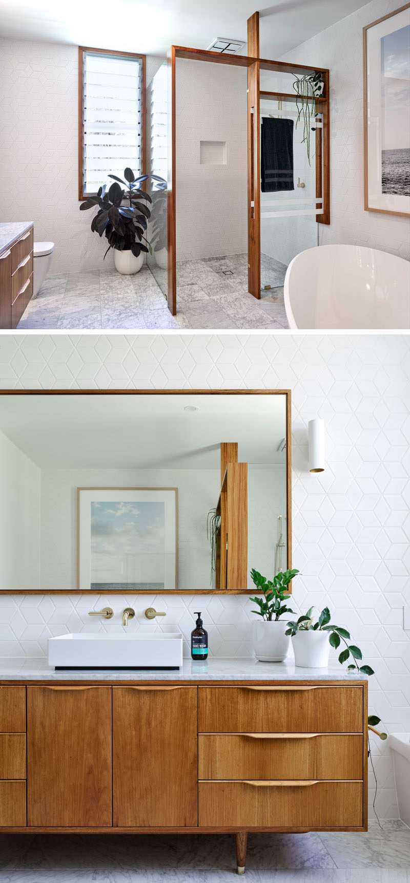 In this modern bathroom, wood frames have been used to provide support for the glass shower surround. Geometric white tiles on the walls add a slight texture, while the wood vanity ties in with the other wood elements for a contemporary bathroom design.