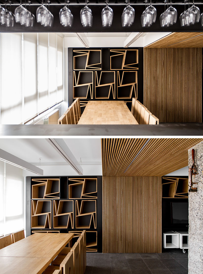 FLORES taller de arquitectura have design a pair of chairs that when stacked on top of each other they form a shape that can then neatly be stored away in a custom designed wall.