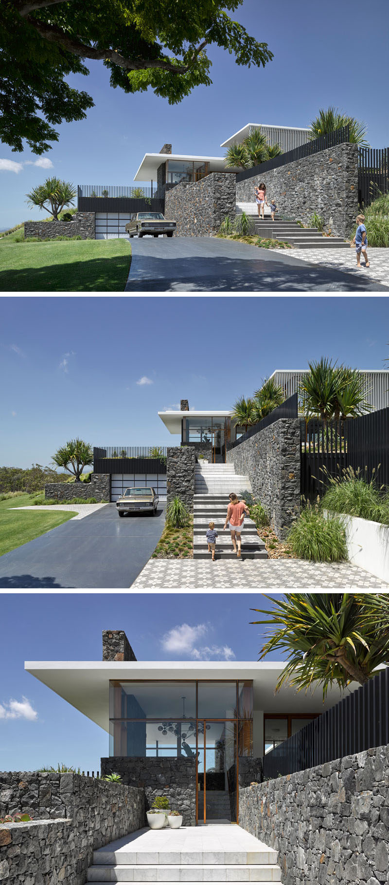 At the front of this modern house and along the driveway are bluestone walls. These walls are featured throughout the home and are intersected by concrete planes.