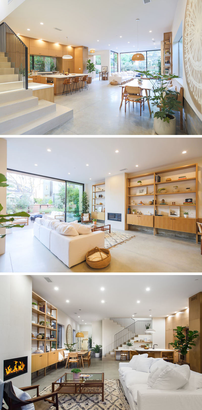 The living room in this modern open floor plan features warm custom millwork in the form of shelving units that sit on each side of the fireplace, and it also opens up directly to the outdoor living room