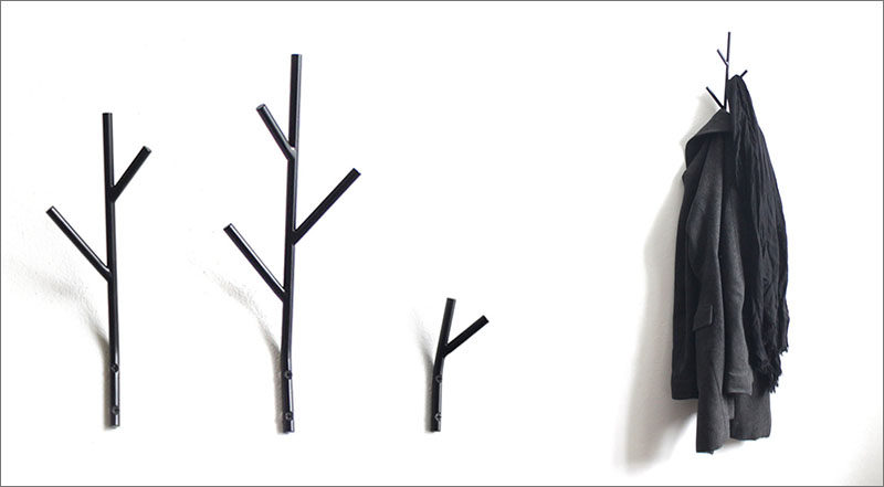 Minimalist, twig shaped hooks made from metal add a touch of natural whimsy to your walls.