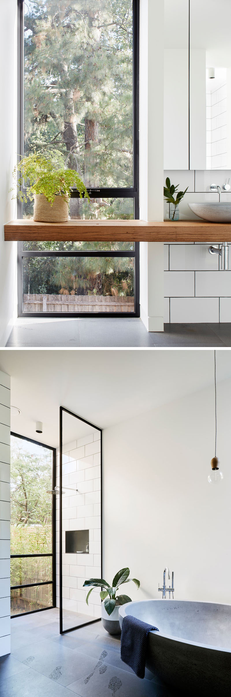 This modern bathroom is kept bright and airy with the use of glass partitions and white walls and tiles. Black accents are used throughout in the form of window frames and tile grout.