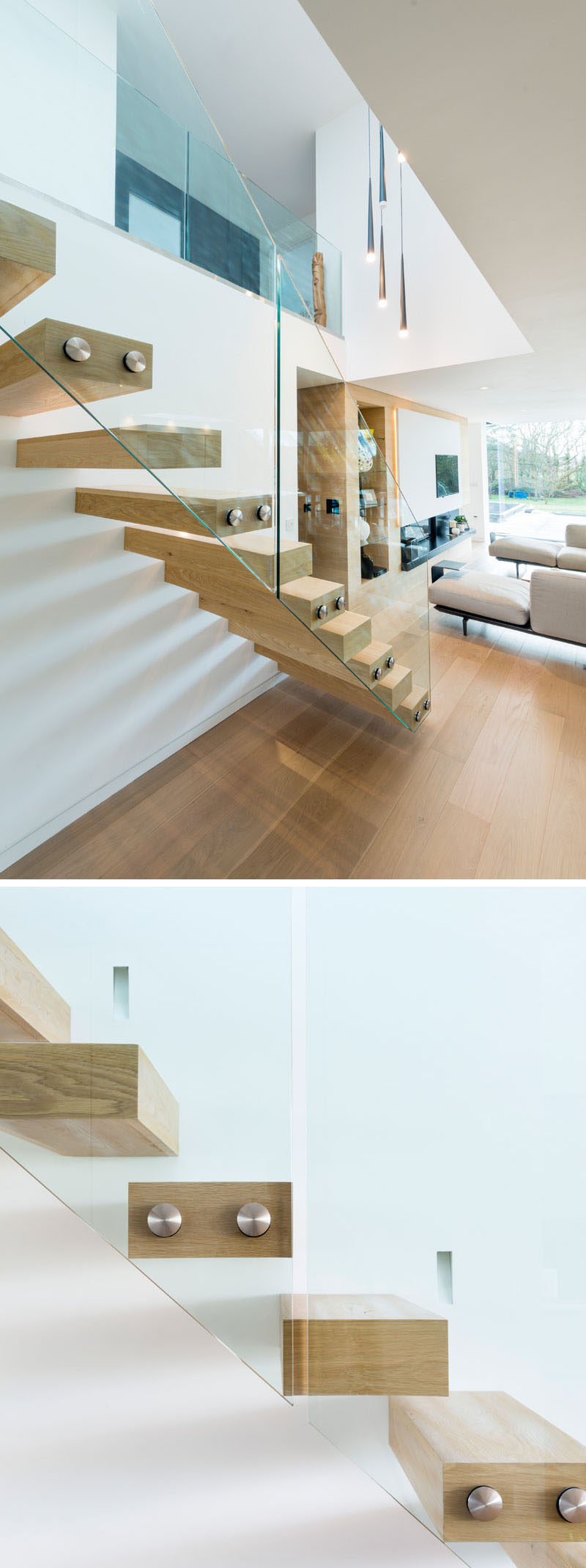 This modern wood and glass staircase leads to the upper floor of this house.