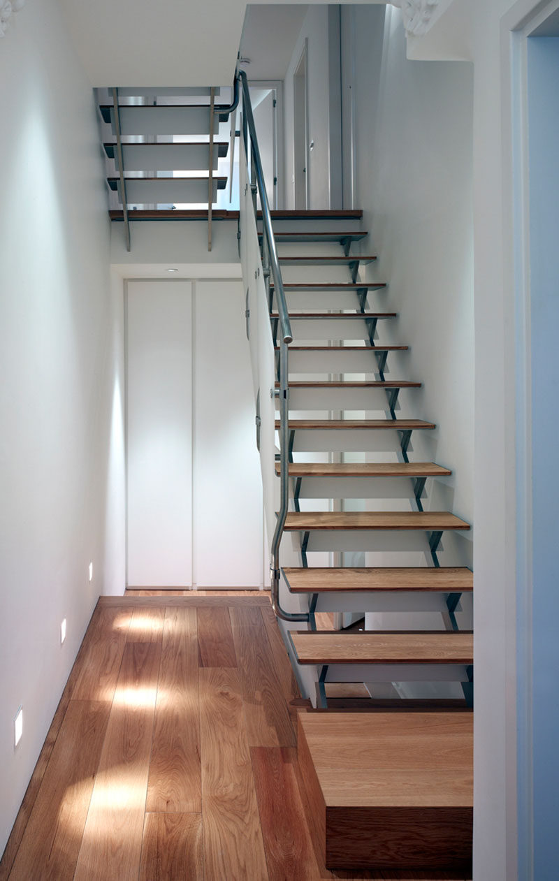 Throughout this renovated house, the original floor was replaced with an oak engineered wide board flooring.