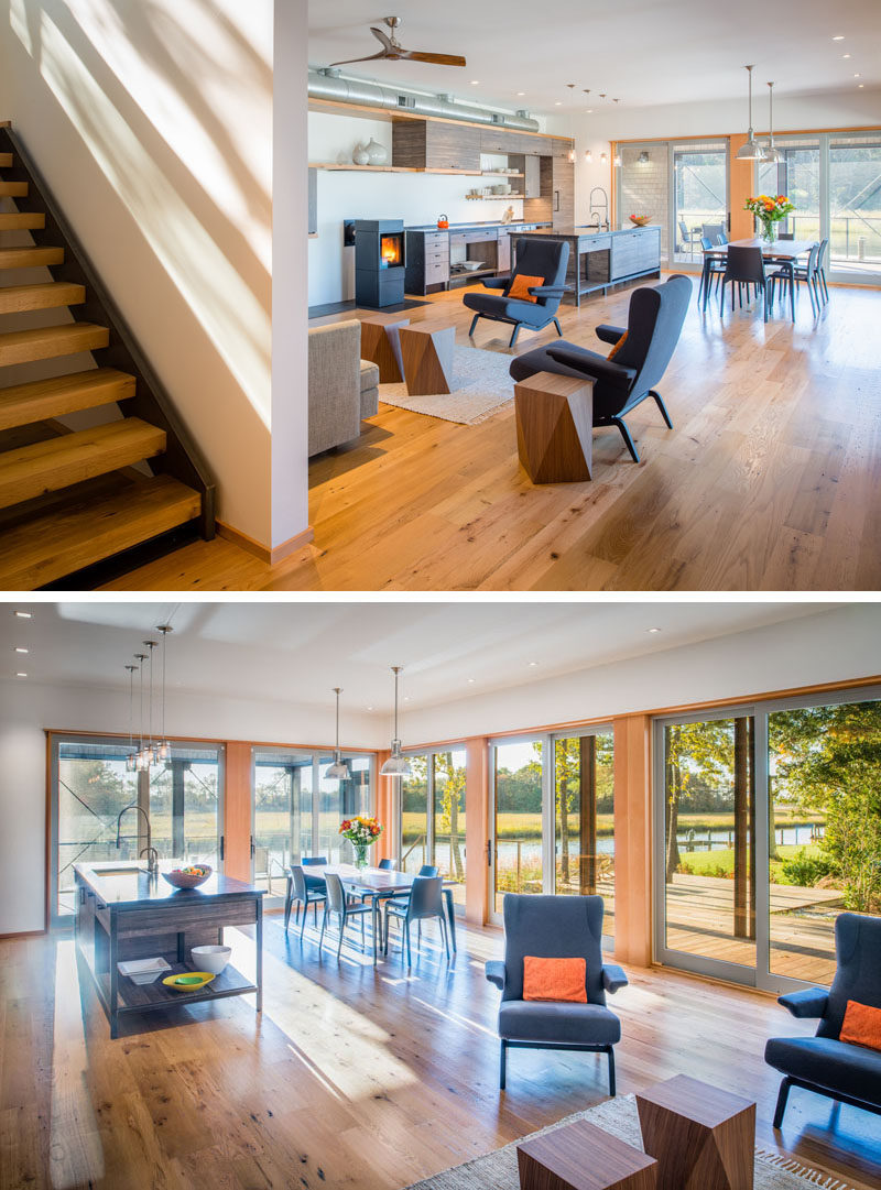 Inside this modern house, the interior is bright and airy. The main living, dining and kitchen area is open plan, with sliding glass doors on two sides of the room.