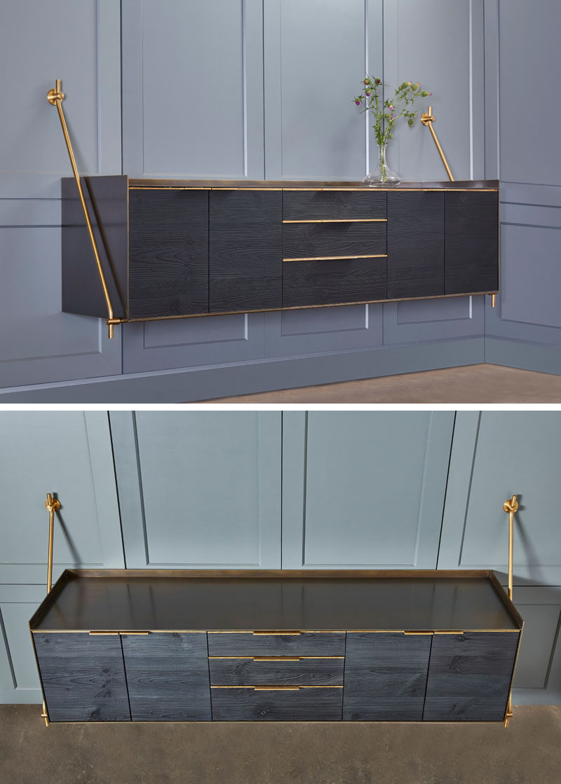 Amuneal have designed a wall hanging credenza that's made from a charred pine exterior wrapped in darkened brass with warm brass accents.