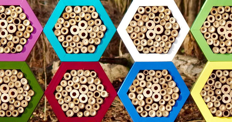 This Bee Hotel takes on a hexagonal shape similar to the shape of honeycomb and creates many hiding places for non-aggressive insects like solitary bees, bumblebees and ladybugs. #BeeHotel #Bees #Garden #Design
