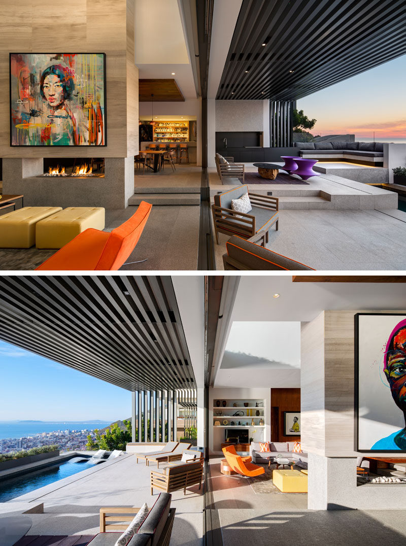 The living room in this modern house opens out to a covered outdoor space with a bar area, lounge and a plunge pool.