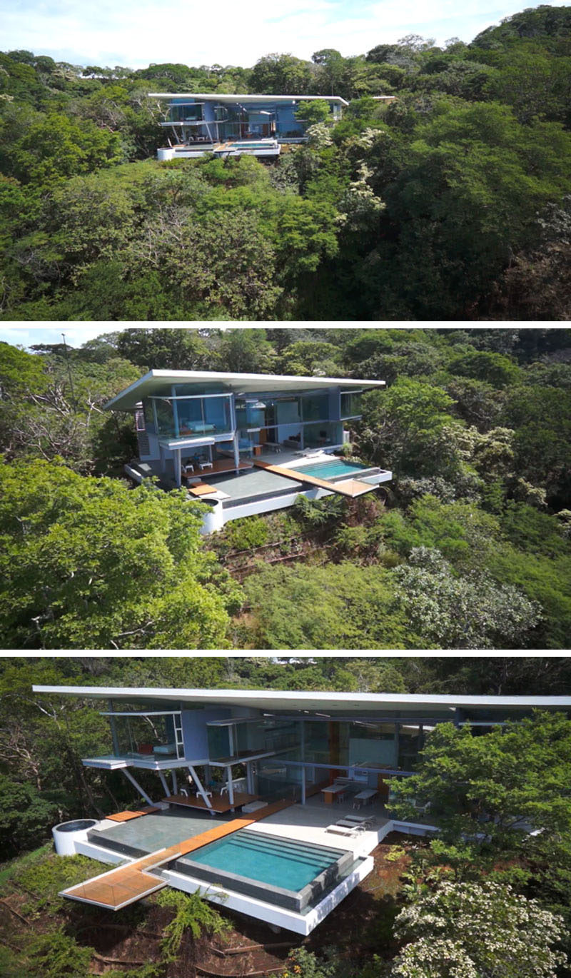 Cañas Arquitectos have designed this modern house in the Papagayo peninsula in Costa Rica, that's surrounded by forest and has water views.
