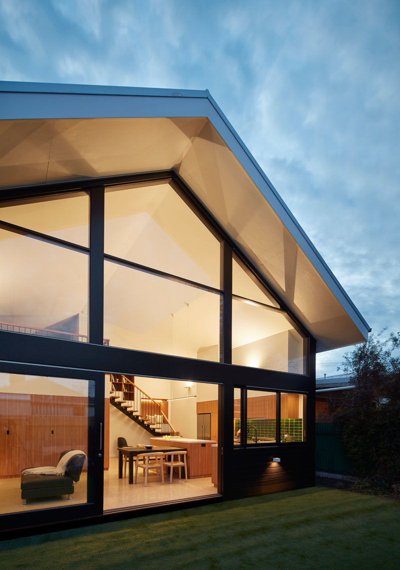 Architecture firm RK-D have designed a modern extension to a house in Melbourne, Australia, that acts as the 'social' area of the house and includes a new open plan kitchen and living room as well as a mezzanine level.