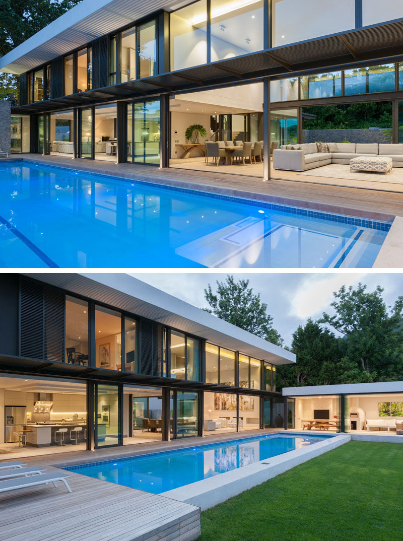 This modern house has been designed so that the main floor opens up to the swimming pool and deck.