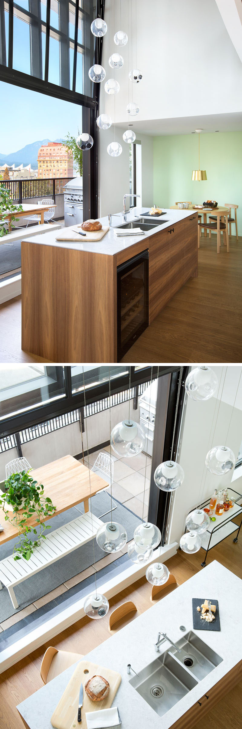 This modern kitchen island has a built-in wine fridge, undermount sinks, storage, and the countertop overhangs slightly on one side to enable people to sit at the counter.