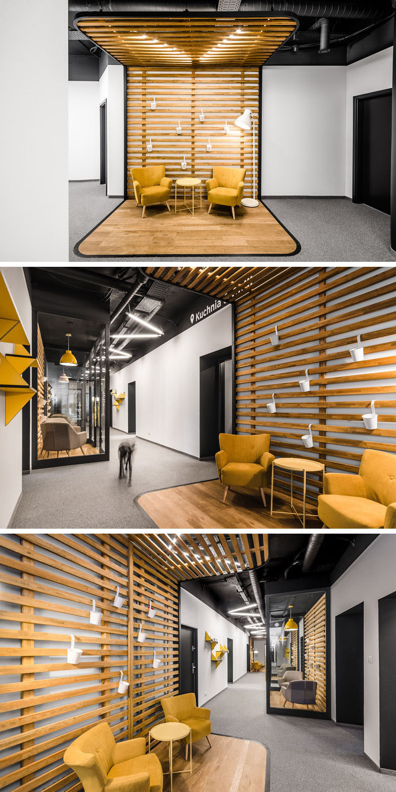 Just outside the reception area in this modern office is a hallway that has a clearly defined seating areas. Wood slats with a black frame wrap around from the ceiling to the wood floor.