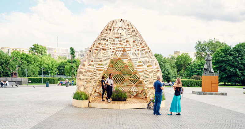 Russian designer Vlad Kissel, has created a modern wood pavilion in Moscow, Russia, that has a drop like shape and references early Slavonic aesthetics.
