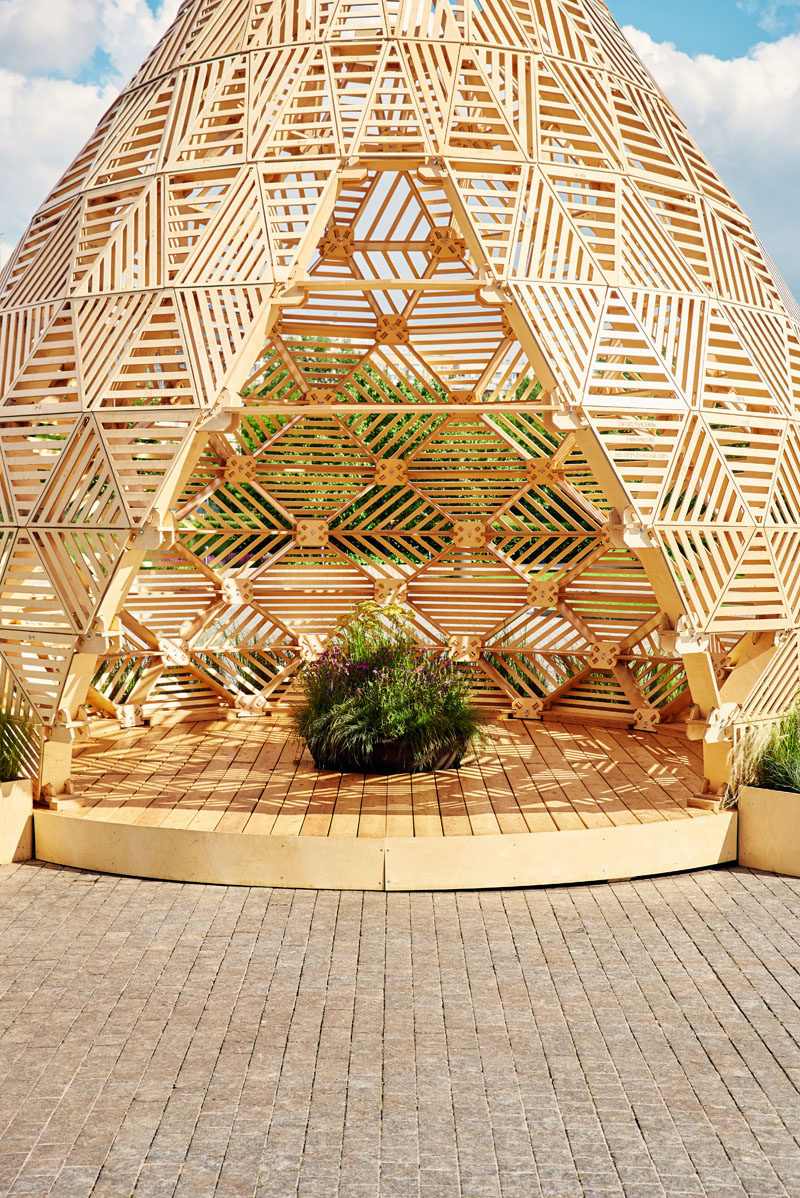 Russian designer Vlad Kissel, has created a modern wood pavilion in Moscow, Russia, that has a drop like shape that references early Slavonic aesthetics.