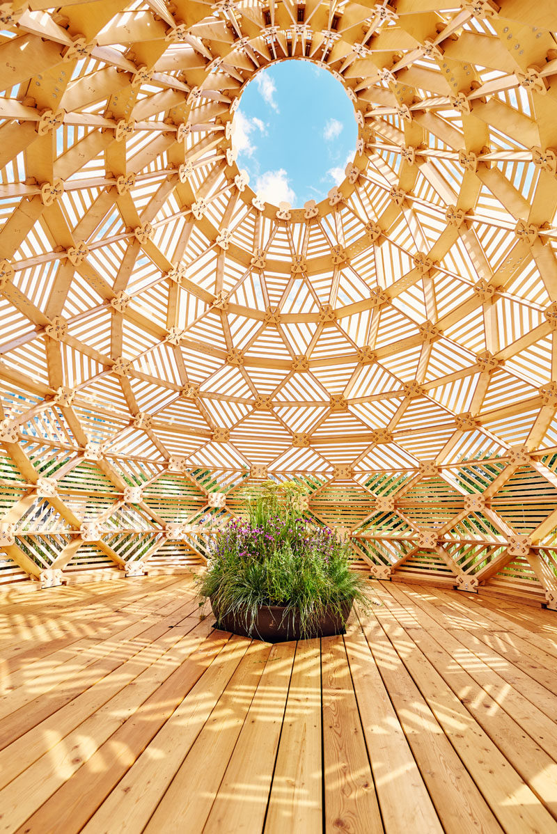 Russian designer Vlad Kissel, has created a modern wood pavilion in Moscow, Russia, that has a drop like shape that references early Slavonic aesthetics.