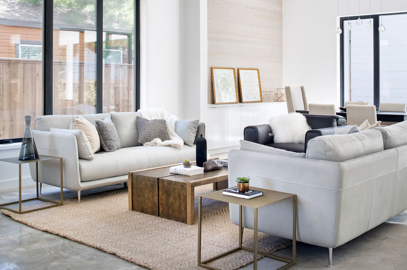 Stepping inside this modern house, the interior has been designed to be light and airy, creating a calm and relaxing environment. #LivingRoom #ModernLivingRoom #InteriorDesign #Interiors